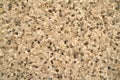 Pebble stone floor tile seamless background. Cement mixed gravel pebble stone floor texture. Royalty Free Stock Photo