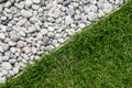 Pebble stone and green grass Royalty Free Stock Photo