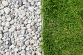 Pebble stone and green grass Royalty Free Stock Photo