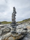 Pebble stone tower arrangement on sea beach Royalty Free Stock Photo