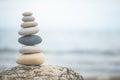 Pebble tower balance harmony stones arrangement on sea beach coastline peaceful formation pyramid Royalty Free Stock Photo