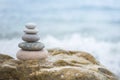 Pebble tower balance harmony stones arrangement on sea beach coastline peaceful formation pyramid