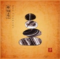 Pebble zen stones balance on vintage background. Traditional Japanese ink painting sumi-e. Contains hieroglyphs - zen Royalty Free Stock Photo