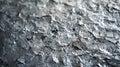 A pebbled metal surface with a rough bumpy texture resembling a rough mountain terrain Royalty Free Stock Photo