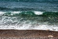 Pebbles Beach and Blue Sea Royalty Free Stock Photo