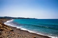 Pebbles Beach and Blue Sea. Toned Royalty Free Stock Photo