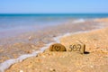 Pebbles with the inscription I love the sea on the beach by the sea.