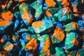 Pebbles painted bright colored paint Royalty Free Stock Photo