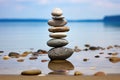 pebbles stacked into a balancing tower on a peaceful beach