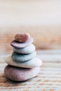 Pebbles stacked on a wooden background - Atmosphere of serenity