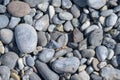 Pebbles and stones rounded by the sea, abstract background composition Royalty Free Stock Photo