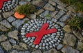 pebbles stuck in cement glue. it forms a carpet of rounded stones. massage