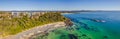 Pebbly Beach Aerial Morning Shorescape Panorama with High Rises