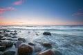 The pebbly beach in Poland at sunset