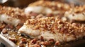 Pecan-crusted chicken breasts on a white serving platter