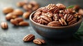 Pecan nuts in a bowl on a dark surface Royalty Free Stock Photo