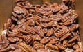 Pecan nuts for sale in wooden box Royalty Free Stock Photo