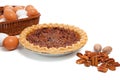 Pecan pie with ingredients on a white background Royalty Free Stock Photo