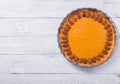 Pecan, Pumpkin, Thanksgiving Holiday Pies on a rustic table with decorative gourds. Top view