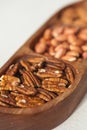 Pecan in a wooden bowl