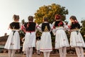 PECINCI, SERBIA - JULY 15, 2023: group of children, girls dancing a Serbian kolo in Pecicni, serbia. Srpsko kolo is a traditional Royalty Free Stock Photo