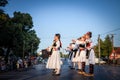 PECINCI, SERBIA - JULY 15, 2023: group of children, girls dancing a Serbian kolo in Pecicni, serbia. Srpsko kolo is a traditional Royalty Free Stock Photo