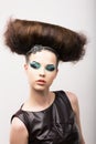 Peculiar Emotional Girl with Odd Creative Styling. Fantastic Hairdo. High Fashion