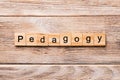 Pedagogy word written on wood block. Pedagogy text on wooden table for your desing, concept Royalty Free Stock Photo