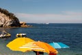 Pedal boats in the clear water of Padulella beach, Island of Elba, Italy