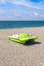 Pedalo on a gravel beach