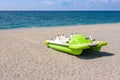 Pedalo on a gravel beach