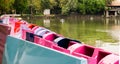A pedalo or paddle boat is a small human-powered watercraft propelled by the action of pedals turning a paddle wheel. Royalty Free Stock Photo