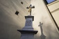 Pedestal with christian cross and crucified Jesus Christ. Royalty Free Stock Photo