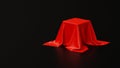 Pedestal covered with luxurious red cloth on black background in studio