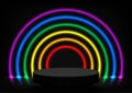 Pedestal scene for show product display decorated with rainbow glowing neon light isolated on black background. Royalty Free Stock Photo