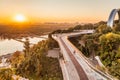 Pedestrian bicycle bridge in Kyiv, dawn, summer, bright sunny weather, aerial view