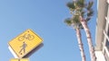 Pedestrian bike crossing yellow road sign, California USA. Ped and bicycle xing. Royalty Free Stock Photo