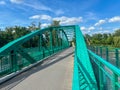 A pedestrian bridge over the Oder River in Opole, Poland, constructed using riveted technology Royalty Free Stock Photo