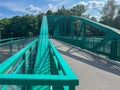 A pedestrian bridge over the Oder River in Opole, Poland, constructed using riveted technology Royalty Free Stock Photo