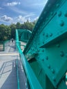 A pedestrian bridge over the Oder River in Opole, Poland, constructed using riveted technology Royalty Free Stock Photo