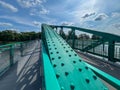 A pedestrian bridge over the Oder River in Opole, Poland, constructed using riveted technology Royalty Free Stock Photo