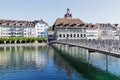 Pedestrian bridge over Reuss river Royalty Free Stock Photo