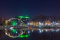 Pedestrian bridge over the river Odra in the Old Town of Wroclaw at night. Poland Royalty Free Stock Photo