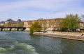 Pedestrian bridge Pont des Arts over Seine river and historic buildings of Paris France Royalty Free Stock Photo