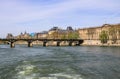 Pedestrian bridge Pont des Arts over Seine river and historic buildings of Paris France Royalty Free Stock Photo