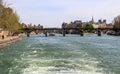 Pedestrian bridge Pont des Arts over Seine river and historic buildings of Paris France Royalty Free Stock Photo
