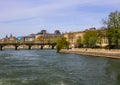 Pedestrian bridge Pont des Arts over Seine river and historic buildings of Paris France Royalty Free Stock Photo