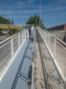 Pedestrian bridge under renovation in the pavement painting phase under the paved road of Avenida Marechal Gomes da Costa