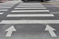 Pedestrian crossing with arrows on the asphalt. pedestrian markings on the road Royalty Free Stock Photo