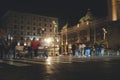 Pedestrian crossing in the historic center of Belgrade, blurred figures of people in the night city